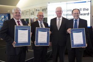 Photo of 2014 National Fellow award recipients with Terry Moran